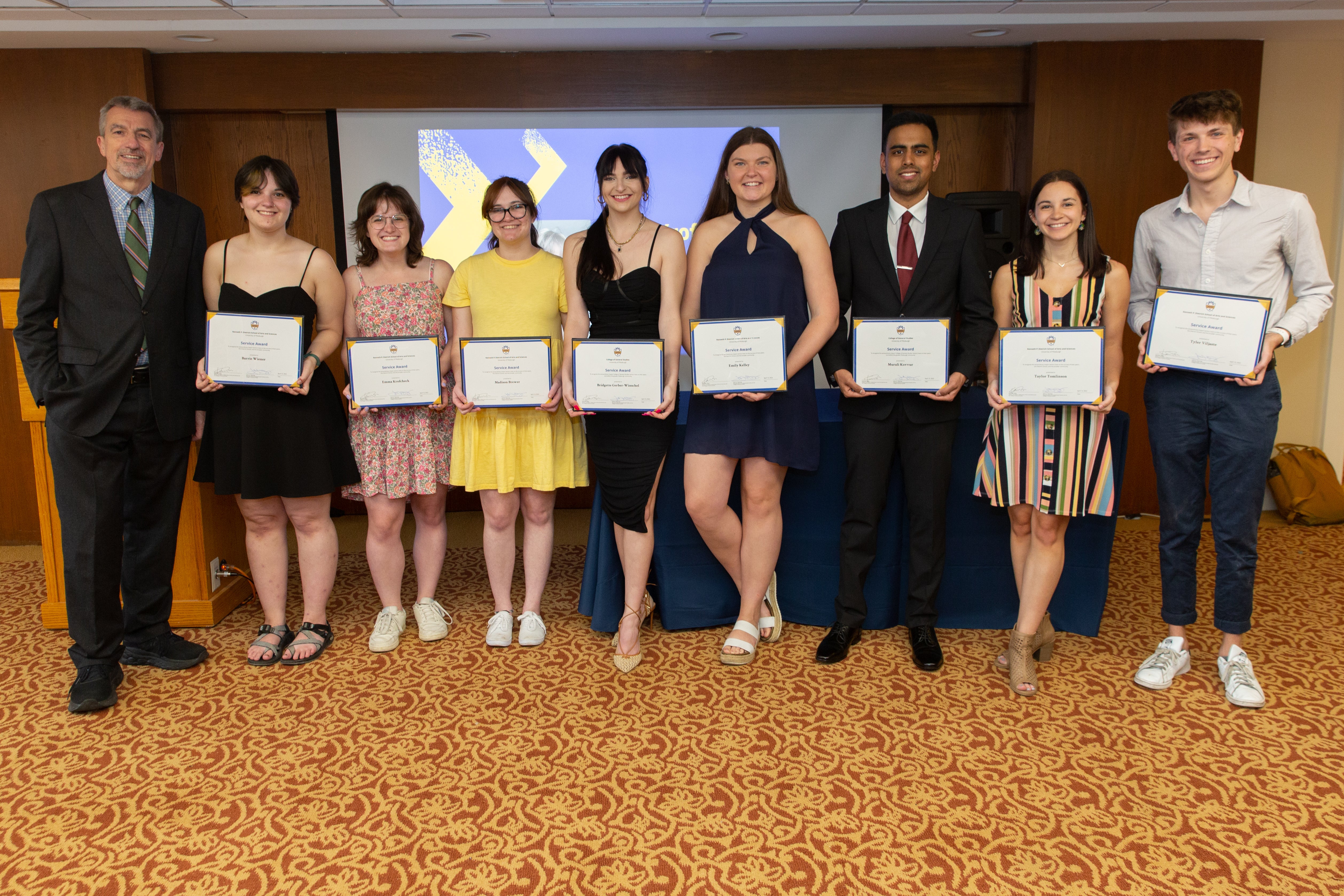 Students pose with Associate Dean