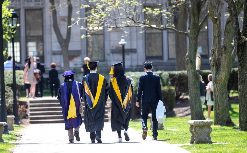 Students graduating wearing regalia