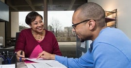 Adult student discusses academic plan with advisor