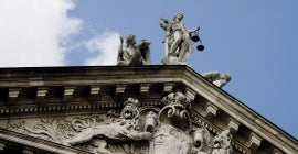 Statue of Justice on top of building