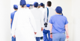 Halthcare professionals in hallway