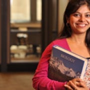 Student holding a book