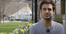 Student Joshua Rosen sitting outside of Posvar Hall